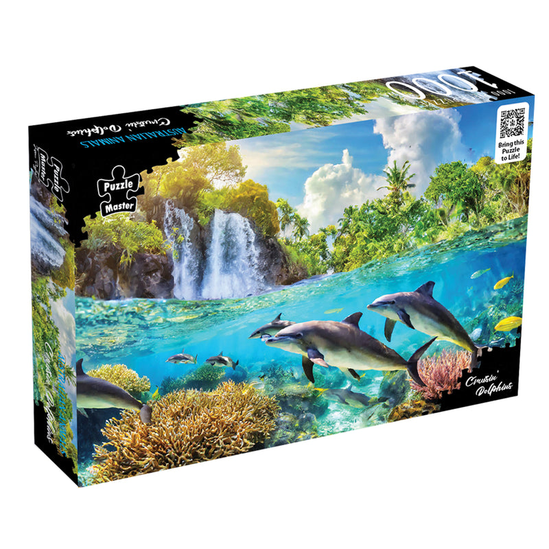 Load image into Gallery viewer, Box packaging for the Puzzle Master Australian Animals Cruisin' Dolphins jigsaw puzzle featuring dolphins swimming below a tropical waterfall.
