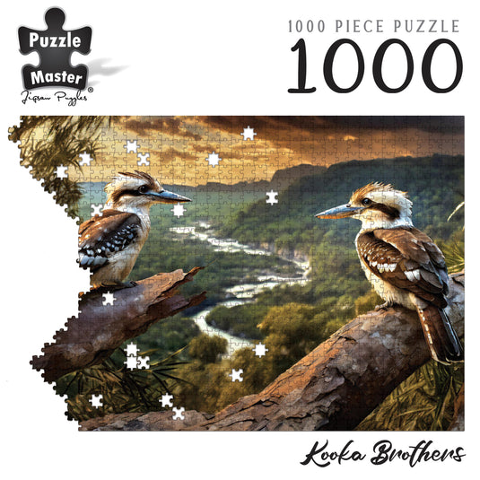 Puzzle Master 1000 piece jigsaw puzzle titled Kooka Brothers showing two kookaburras perched above a valley view.