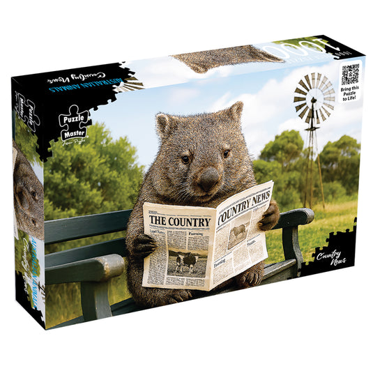 Puzzle box for Puzzle Master Australian Animals Country News jigsaw puzzle showing a wombat reading a newspaper on a bench.